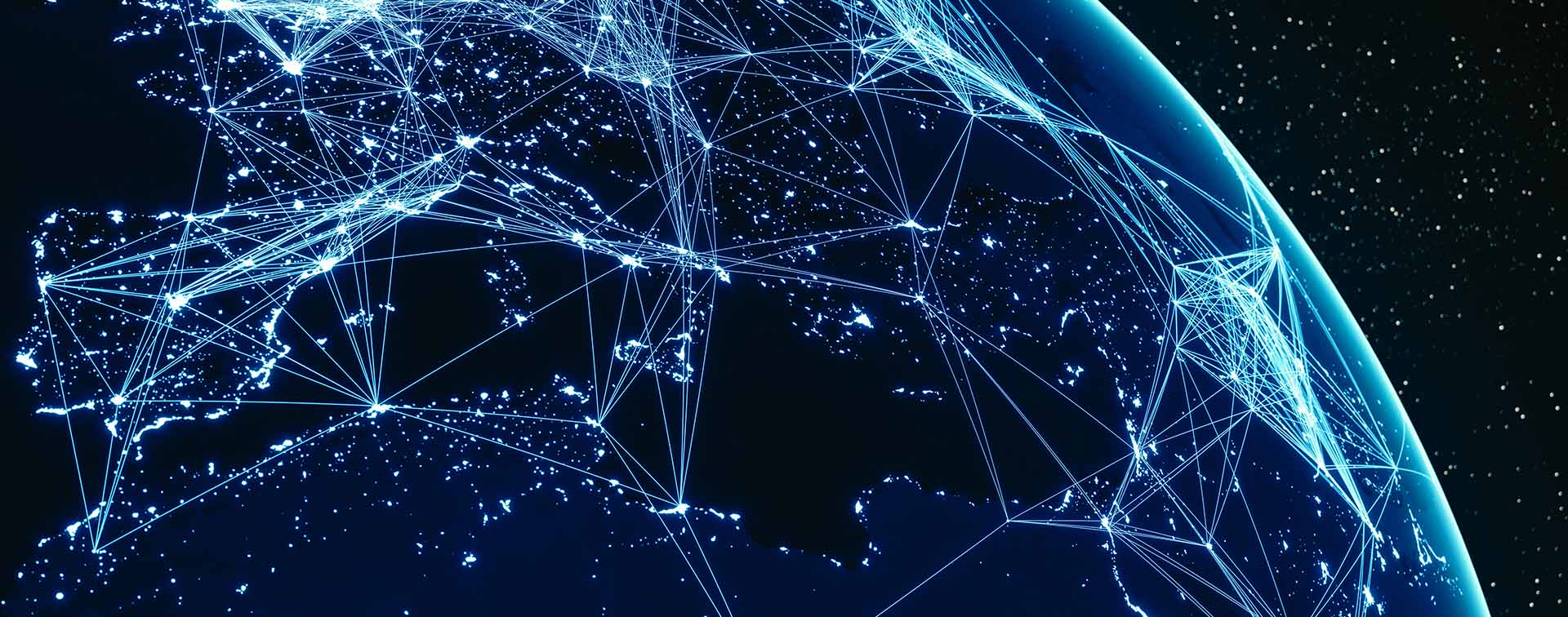 Digital composite of the earth with glowing lines connecting continents