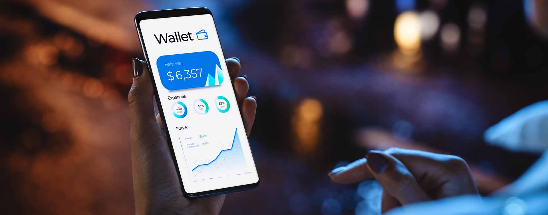 Woman using smartphone to check the balance of an online wallet