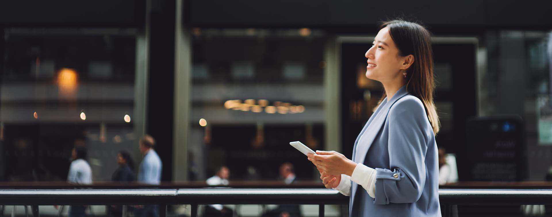 Woman on the go in a business district
