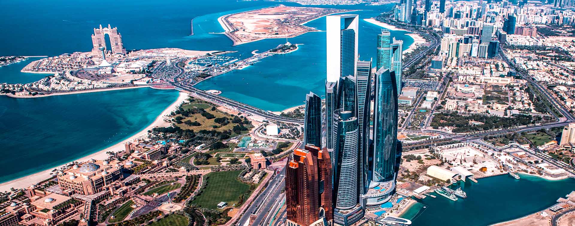 Wonders of modern architecture in Abu Dhabi, UAE, taken from a helicopter high above the city